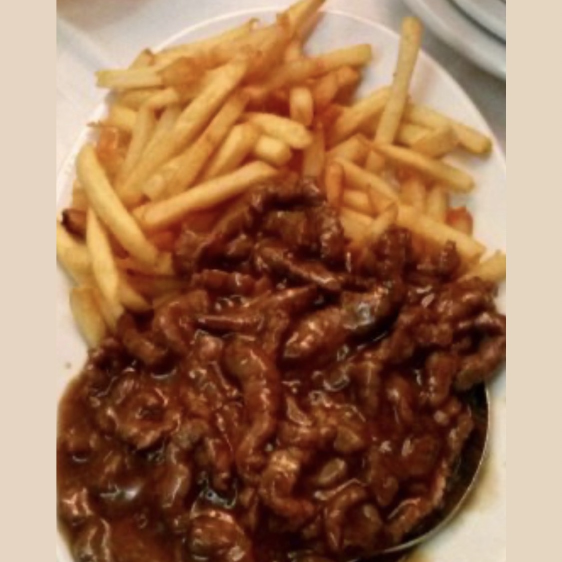 Ternera con patatas fritas